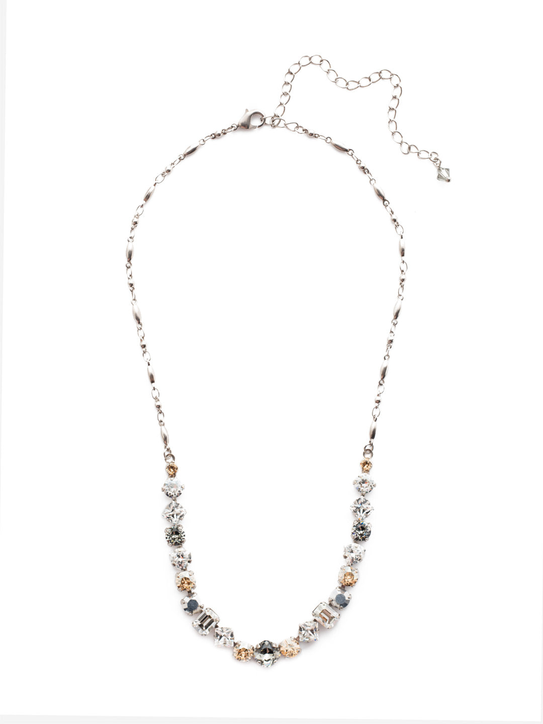 Papaver Tennis Necklace - NDX14ASGNS - This classic half line crystal necklace features an assortment of geometric shapes finished with a delicate metal chain. From Sorrelli's Golden Shadow collection in our Antique Silver-tone finish.