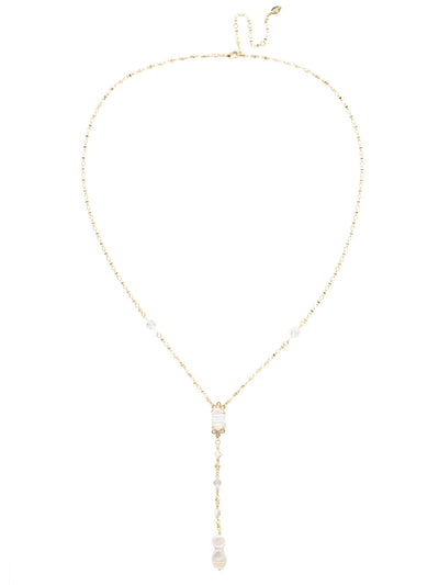Ninetta Long Strand Necklace - NEC20BGCRY - This long strand Y necklace sits lower and features multiple shapes of natural pearl, crystal beads and decorative chain.