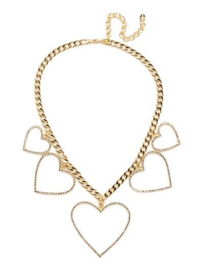 Alair Necklace Classic Necklace - NEC22BGPLP - Open to Love! Five crystal heart medallions adorn this line necklace for ultimate sweetness. A substantial chain adds just the right touch of edge. From Sorrelli's Polished Pearl collection in our Bright Gold-tone finish.