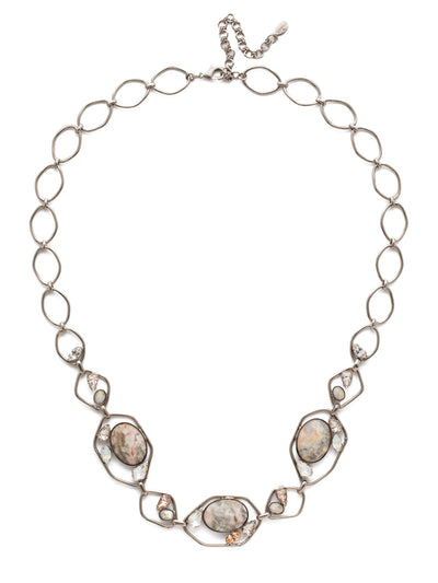 Presley Long Strand Necklace Long Strand Necklace - NEE24ASSCL - <p>A multi-shaped, open link chain design features nestled pear-shaped crystals and oval stones in this organically shaped long strand necklace. Light, airy and easy to wear for everyday with your favorite maxi dress. From Sorrelli's Silky Clouds collection in our Antique Silver-tone finish.</p>