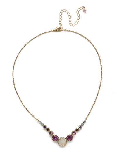 Meera Tennis Necklace - NEF43AGIRB - <p>This simple necklace combines one circular stone with several symmetrical stones on either side to add some sparkle to any look. From Sorrelli's Iris Bloom collection in our Antique Gold-tone finish.</p>