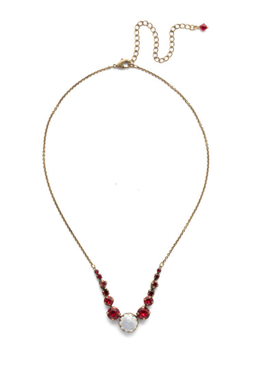 Meera Tennis Necklace - NEF43AGSNR - This simple necklace combines one circular stone with several symmetrical stones on either side to add some sparkle to any look. From Sorrelli's Sansa Red collection in our Antique Gold-tone finish.