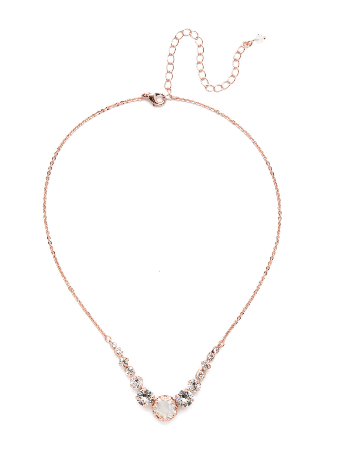 Meera Tennis Necklace - NEF43RGCRY - <p>This simple necklace combines one circular stone with several symmetrical stones on either side to add some sparkle to any look. From Sorrelli's Crystal collection in our Rose Gold-tone finish.</p>