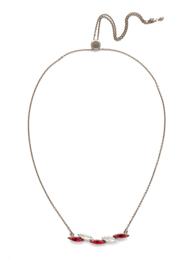 Cersei Tennis Necklace - NEF44ASCP - A delicate chain is held together by a line of dancing gems that adjusts to suit your neckline. This is a great layering piece that can compliment a variety of necklaces from statement to pendant. From Sorrelli's Crimson Pride collection in our Antique Silver-tone finish.
