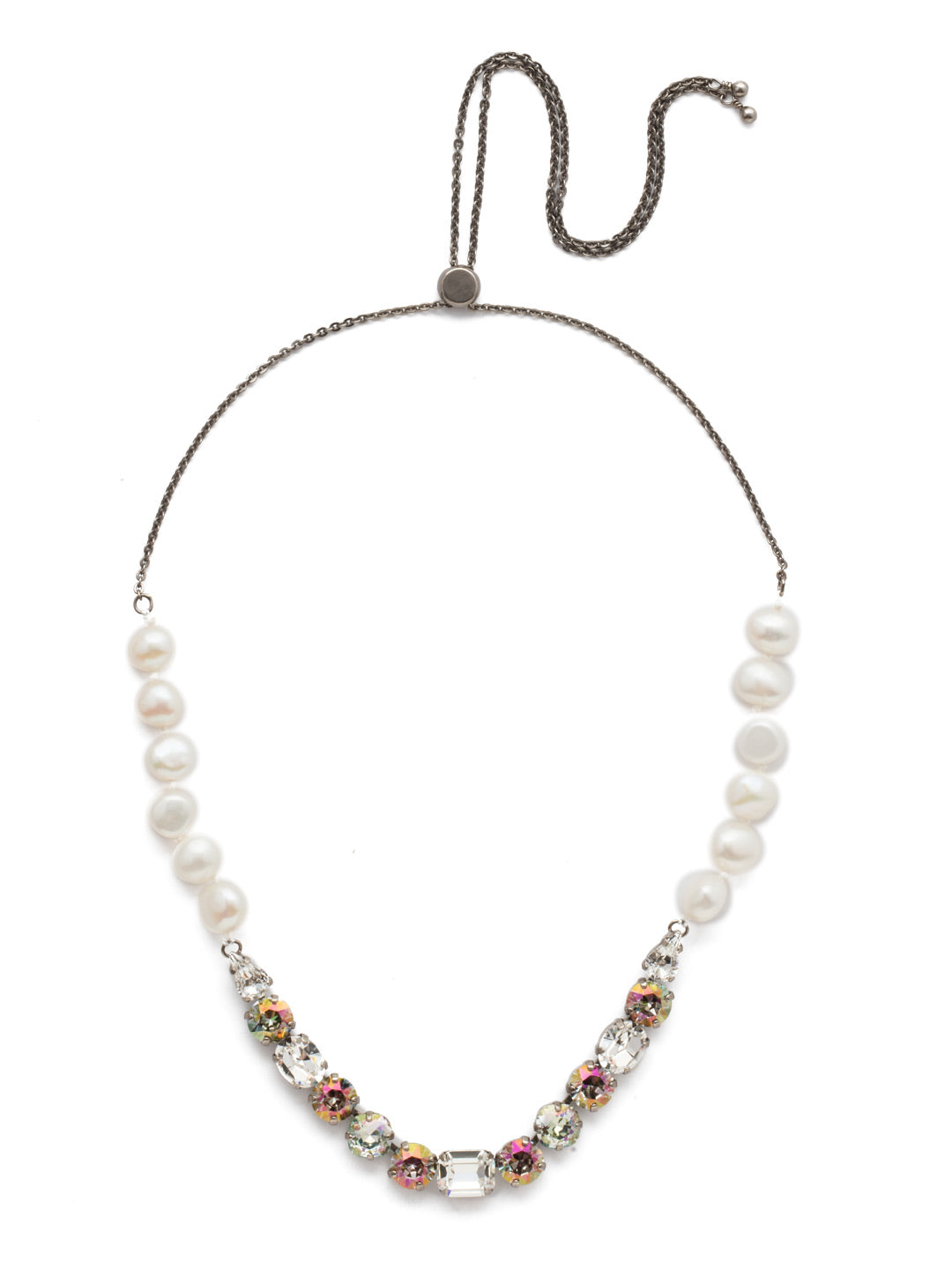 Verona Tennis Necklace - NEH26ASCRE - This classic beauty features wire-wrapped pearls supporting a delicate pattern of crystal shapes at its base with a slider clasp for easy wear. From Sorrelli's Crystal Envy collection in our Antique Silver-tone finish.