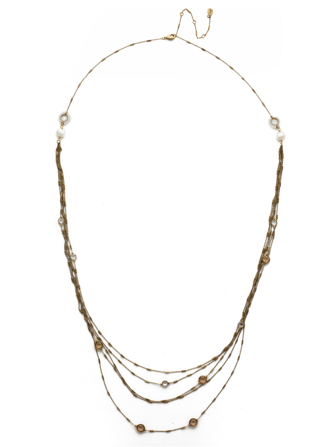 Luminous Layered Necklace - NEK2AGROB - <p>Fasten on layers of filagree, sparkling crystals and freshwater pearl accents with this long strand necklace and you're set and ready to walk into any room as an accessorizing star. From Sorrelli's Rocky Beach collection in our Antique Gold-tone finish.</p>