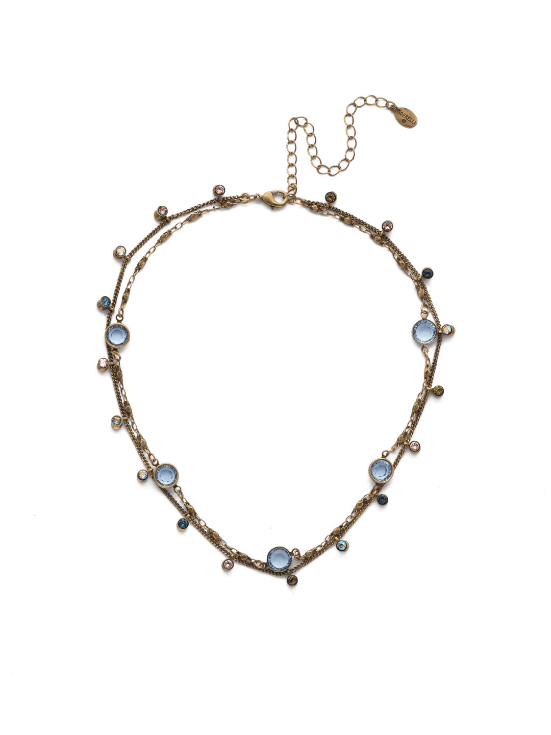 Dewdrop Layered Necklace - NEK36AGSDE - Delicate layers of chain drizzled with droplets of opaque crystals. A quick and easy solution for a layered look with one piece. From Sorrelli's Selvedge Denim collection in our Antique Gold-tone finish.