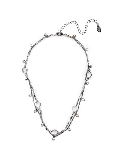 Dewdrop Layered Necklace - NEK36GMGNS - Delicate layers of chain drizzled with droplets of opaque crystals. A quick and easy solution for a layered look with one piece. From Sorrelli's Golden Shadow collection in our Gun Metal finish.