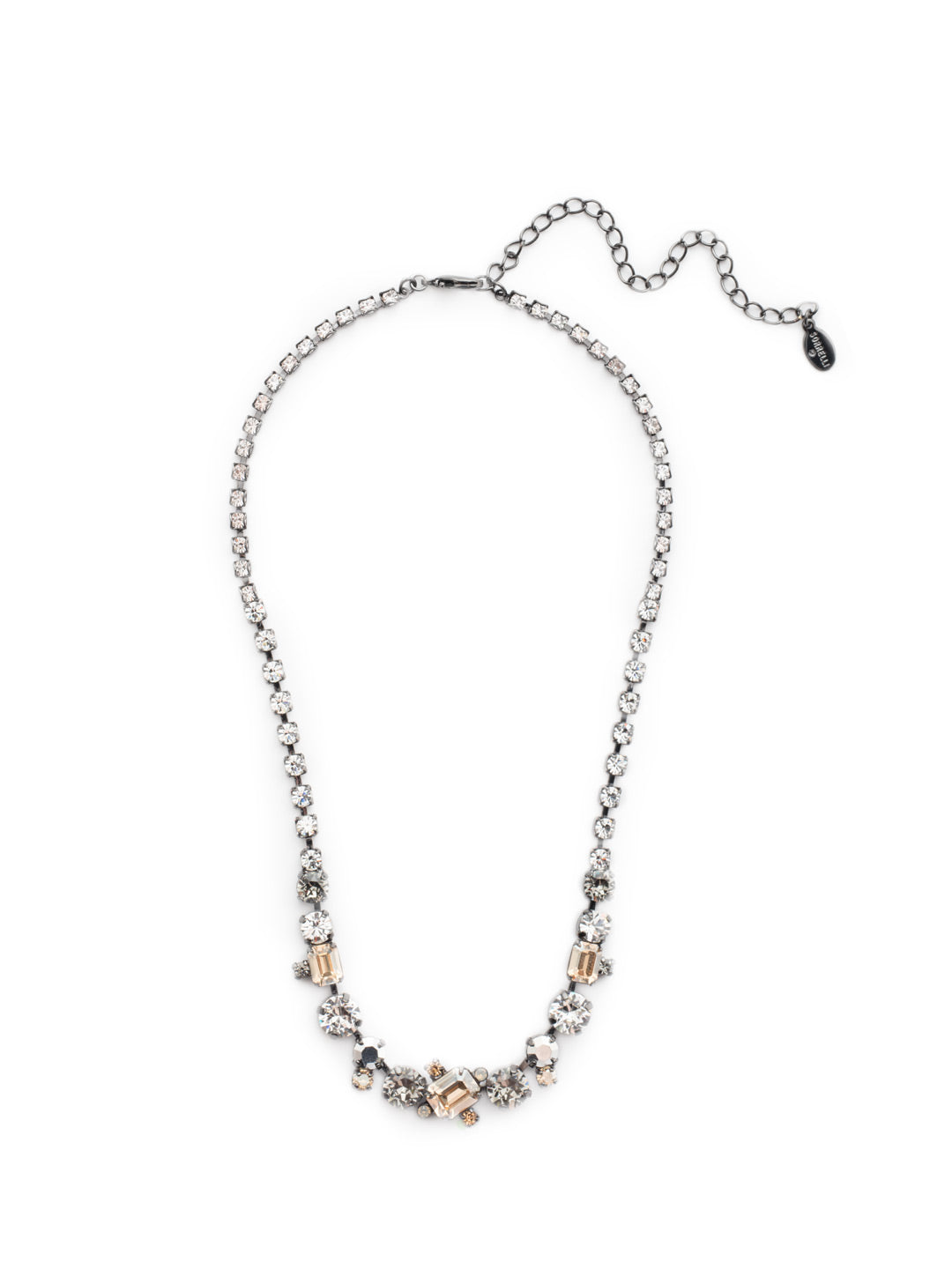 Tinsley Tennis Necklace - NEN17GMGNS - The Tinsley Statement Necklace exudes drama. Every inch is encrusted in sparkling crystals competing to be noticed. Fasten it on when you're looking for some attention. From Sorrelli's Golden Shadow collection in our Gun Metal finish.