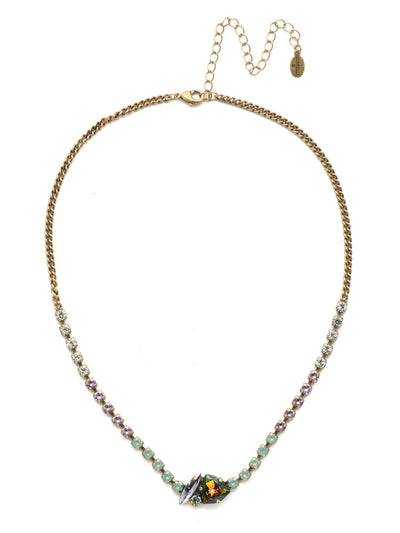Leighton Tennis Necklace - NEN3AGIRB - The Lehighton Statement Necklace is the layer of drama you're looking for when planning a special night out. Anchored with both a statement navette and triangle stone, its strand exudes sparkle, too. From Sorrelli's Iris Bloom collection in our Antique Gold-tone finish.