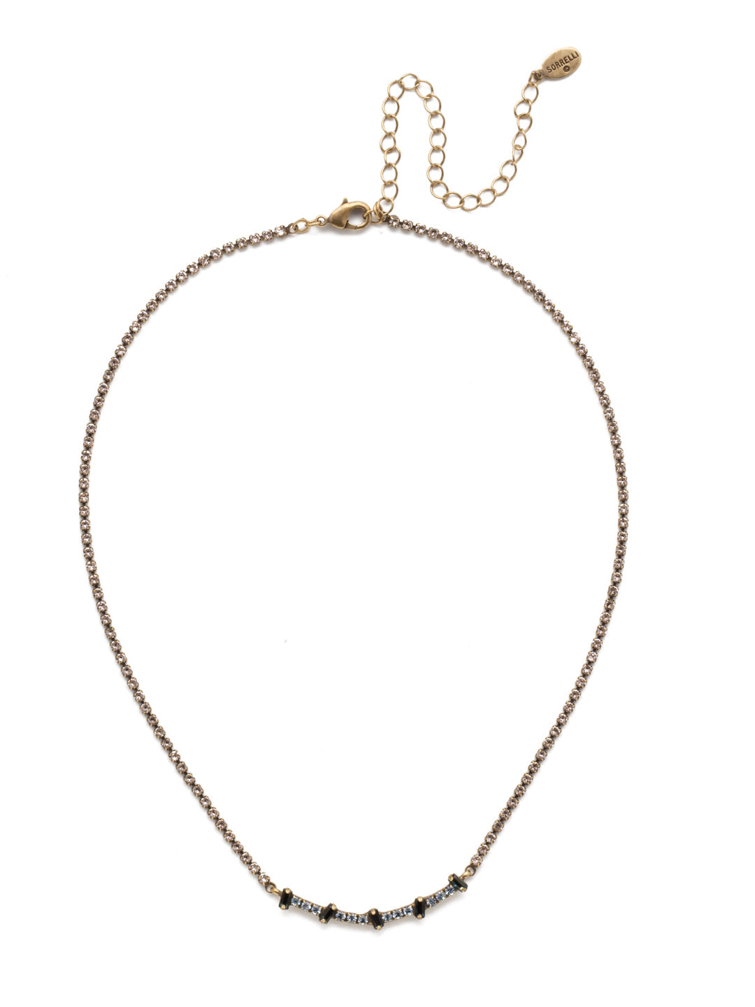 Velma Tennis Necklace - NEP8AGSDE - <p>The Velma Tennis Necklace is the piece you grab when you're looking for a simple shimmer of sparkling crystal. Round stones are offset by black baquette pieces for that something extra special. From Sorrelli's Selvedge Denim collection in our Antique Gold-tone finish.</p>