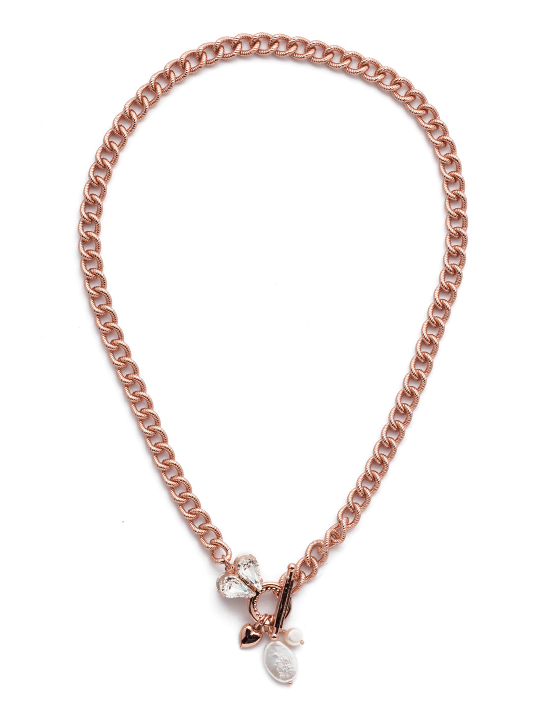 Laguna Pendant Necklace - NER5RGCRY - <p>The Laguna Pendant Necklace makes a strong statement with its metal links, but softens at the center with shimmering crystal and silver hearts joined by freshwater pearl accents. From Sorrelli's Crystal collection in our Rose Gold-tone finish.</p>