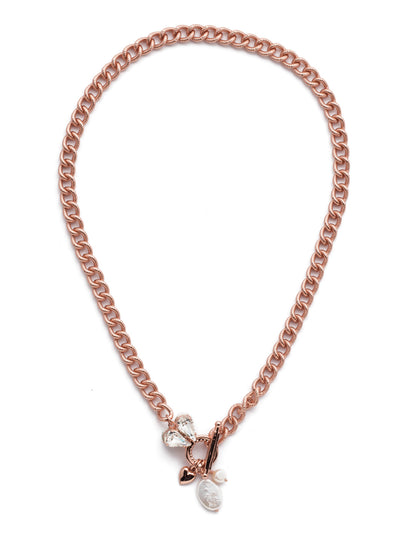 Laguna Pendant Necklace - NER5RGCRY - <p>The Laguna Pendant Necklace makes a strong statement with its metal links, but softens at the center with shimmering crystal and silver hearts joined by freshwater pearl accents. From Sorrelli's Crystal collection in our Rose Gold-tone finish.</p>
