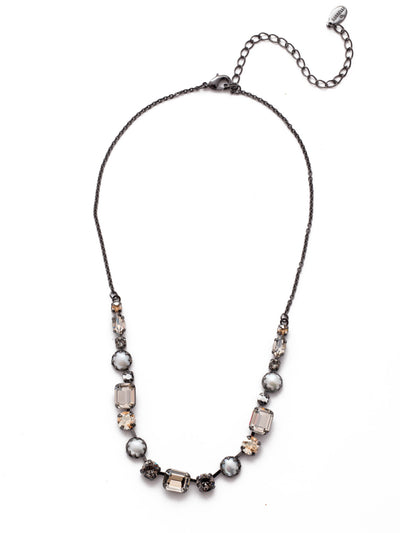 Deandra Tennis Necklace - NES10GMGNS - The Deandra Tennis Necklace is classic style personified: showcasing pretty pearls, opaque gems and sparkling cushion crystals. From Sorrelli's Golden Shadow collection in our Gun Metal finish.