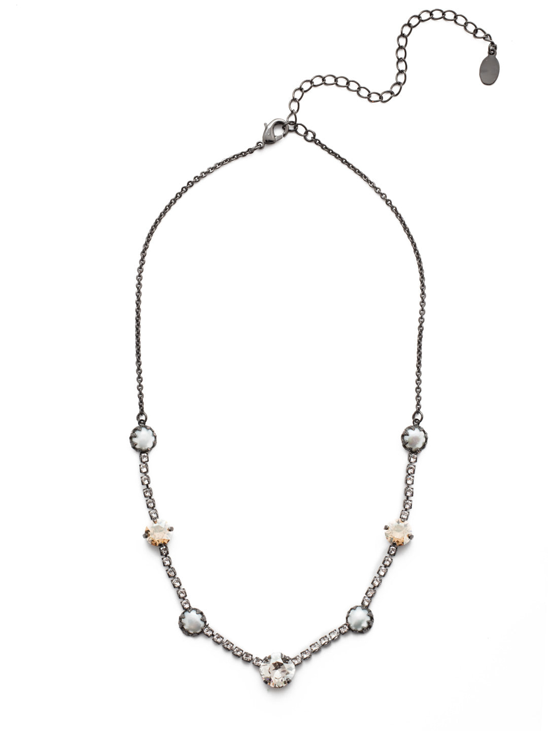 Caterina Tennis Necklace - NES11GMGNS - <p>Our Caterina Tennis Necklace is traditional style plus something extra with links of sparkling crystals bringing together bigger, bolder stones and pretty pearls. From Sorrelli's Golden Shadow collection in our Gun Metal finish.</p>