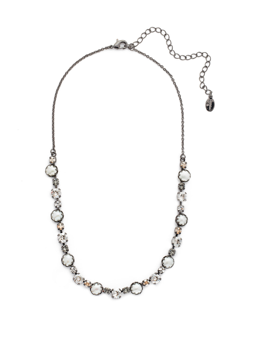 Emmanuella Tennis Necklace - NES12GMGNS - <p>The Emmanuella Tennis Necklace should be a jewelry lover's must-have. What more could you want than its classic pearls, light and dark sparkling crystals in varying sizes and a chain that adjusts to your perfect length? From Sorrelli's Golden Shadow collection in our Gun Metal finish.</p>