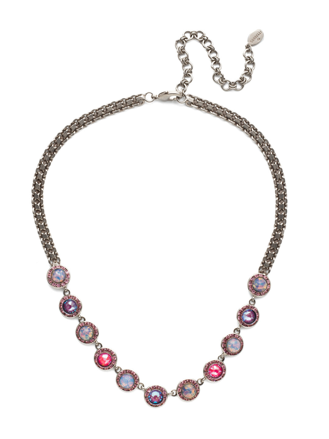 Kaia Statement Necklace - NET10ASETP - The Kaia Statement Necklace is bold with its chunky chainmetal strand that gives way to irredescent gems rimmed in stunning, sparkling crystals. From Sorrelli's Electric Pink collection in our Antique Silver-tone finish.