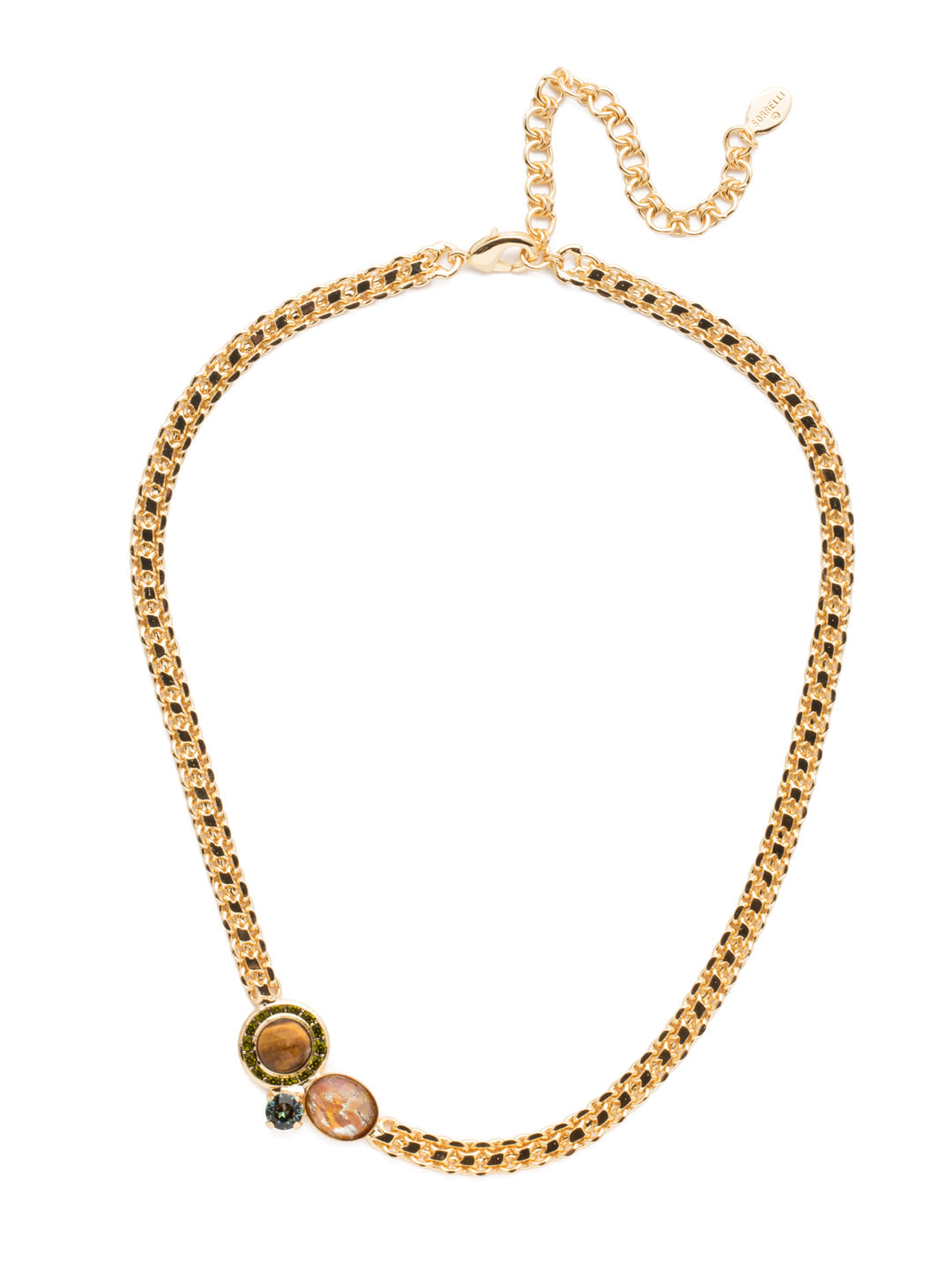 Hartford Tennis Necklace - NET13BGCSM - The Hartford Tennis Necklace is truly unique. The bold metal chain is offset by an off-center cluster of opaque and sparkling stones and crystals. From Sorrelli's Cashmere collection in our Bright Gold-tone finish.