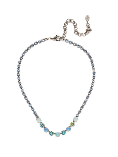Audriana Tennis Necklace - NET37ASBWB - <p>The Audriana Tennis Necklace is all about glamour. Shine across any room with the strand entirely encrusted in sparkling crystals, while larger pieces of varying opacities stand front and center. From Sorrelli's Bluewater Breeze collection in our Antique Silver-tone finish.</p>