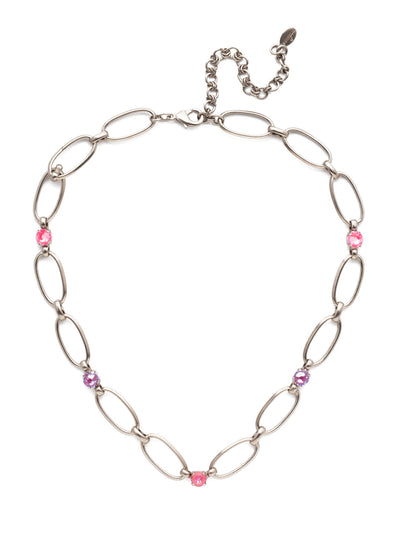 Paige Tennis Necklace - NET3ASETP - <p>The Paige Tennis Necklace is open, airy and sparkly, too. Metallic links are joined with round Sorrelli crystals that shine bright. From Sorrelli's Electric Pink collection in our Antique Silver-tone finish.</p>