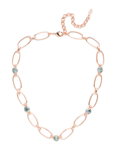 Paige Tennis Necklace - NET3RGCAZ - <p>The Paige Tennis Necklace is open, airy and sparkly, too. Metallic links are joined with round Sorrelli crystals that shine bright. From Sorrelli's Crystal Azure collection in our Rose Gold-tone finish.</p>