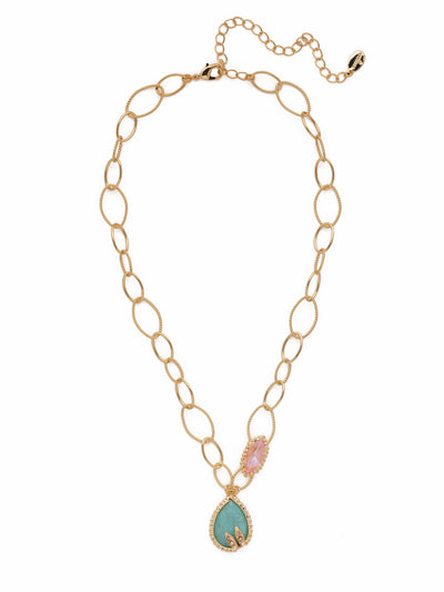 Forrest Pendant Necklace - NEU10BGSOP - <p>Our Forrest Pendant Necklace showcases loops of airy metalwork, a sparkling marquise-shaped crystal and an earthy mineral stone enhanced with just a touch of bling. 'Tis always the season to treat yourself to something fabulous. From Sorrelli's South Pacific collection in our Bright Gold-tone finish.</p>