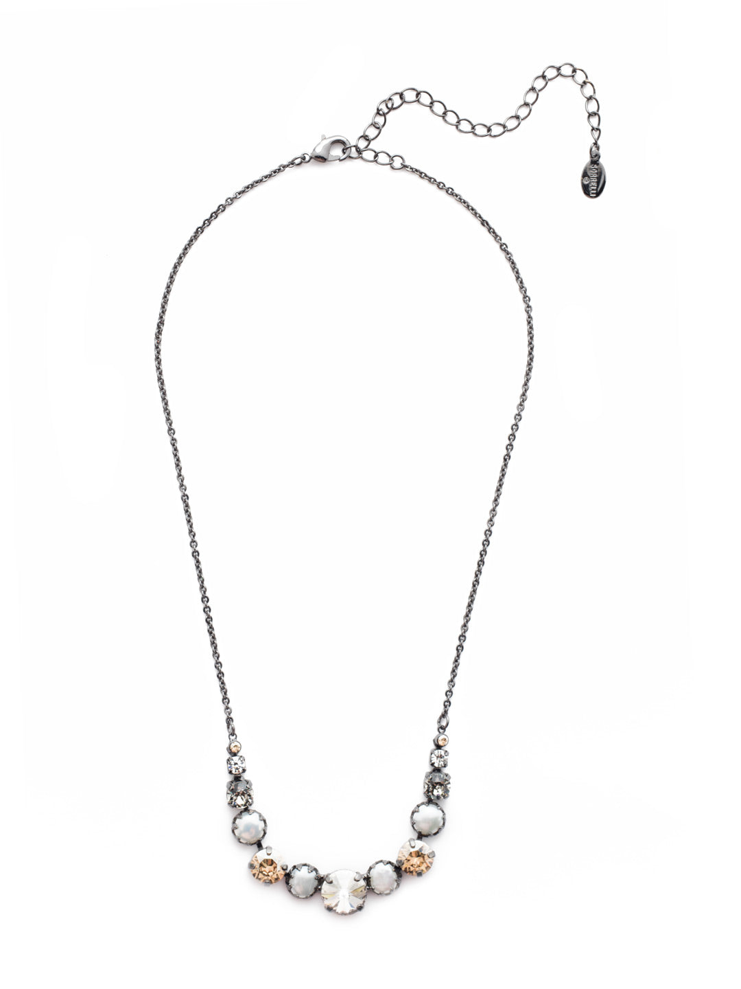 Dallas Tennis Necklace - NEU14GMGNS - <p>The Dallas Tennis Necklace is quintessential Sorrelli. Circular crystal sparklers pair with classic freshwater pearls, making this the perfect additon to your collection or to gift to someone just starting their Sorrelli journey. From Sorrelli's Golden Shadow collection in our Gun Metal finish.</p>