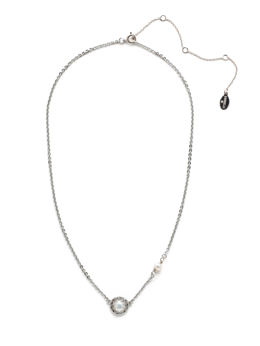 Blair Pendant Necklace - NEV105PDCRY - <p>The Blair Pendant Necklace is the perfect dainty piece to wear with everything! A freshwater pearl takes the spotlight, set in a halo of crystals, while a single delicate pearl sits offset on the adjustable chain. A spring ring clasp secures the necklace. From Sorrelli's Crystal collection in our Palladium finish.</p>