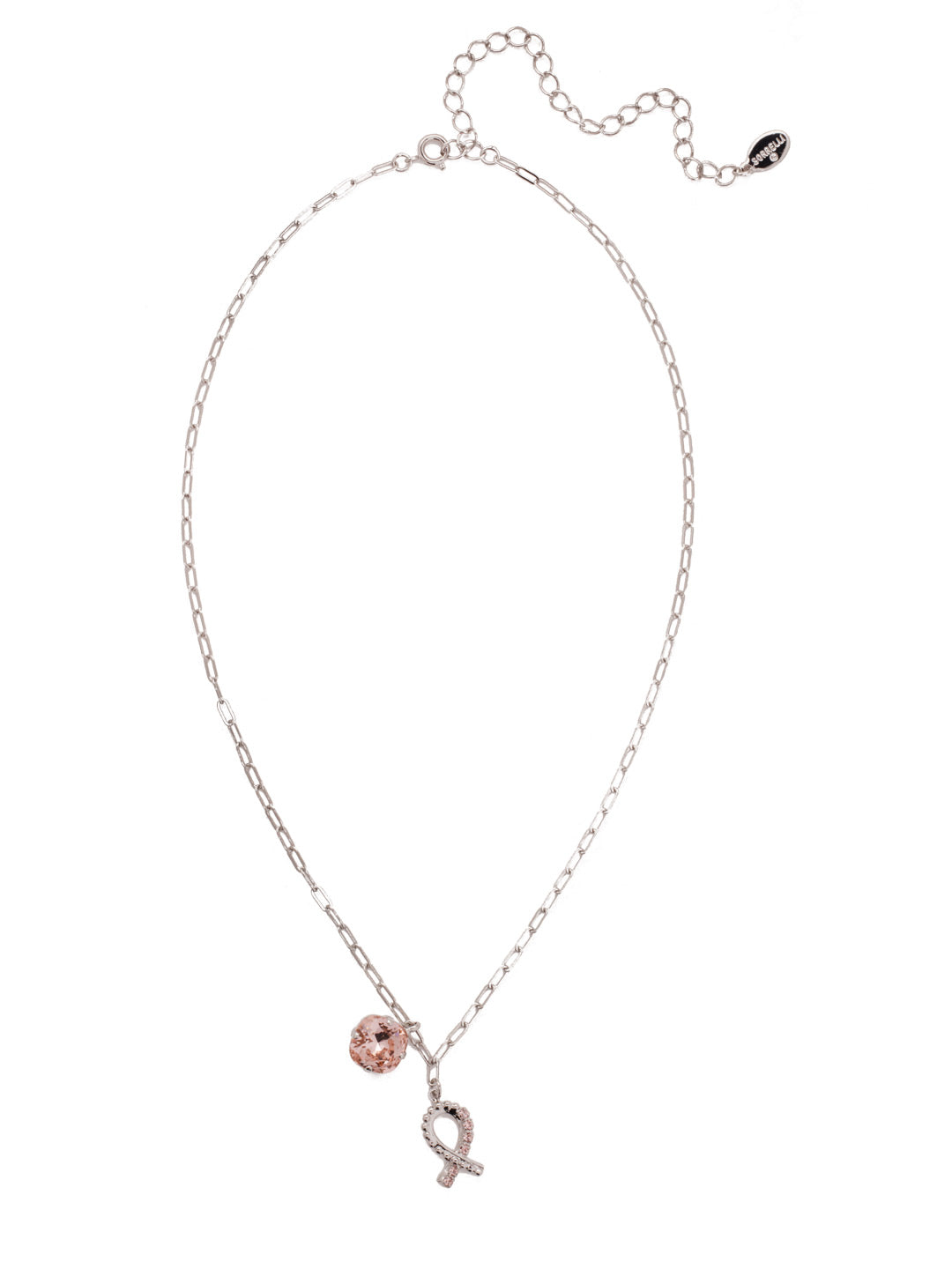 Crystal Ribbon Pendant Necklace - NEV201PDVIN - <p>The Crystal Ribbon Pendant Necklace is created and inspired by the Breast Cancer Awareness ribbon and all the warriors who wear it. Delicate crystals line a metal ribbon, creating a meaningful statement. From Sorrelli's Vintage Rose collection in our Palladium finish.</p>