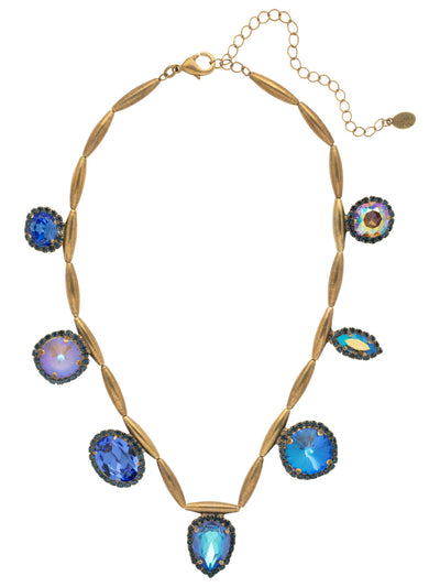 Giselle Statement Necklace - NFC80AGVBN - <p>The Giselle Statement Necklace features a row of assorted halo cut crystals on a tubular style chain, secured with a lobster claw clasp on an adjustable chain. From Sorrelli's Venice Blue collection in our Antique Gold-tone finish.</p>