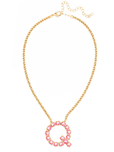 Q Initial Rope Pendant Necklace - NFK36BGETP - <p>The Initial Rope Pendant Necklace features a crystal encrusted metal monogram pendant on an adjustable rope chain, secured with a lobster claw clasp. From Sorrelli's Electric Pink collection in our Bright Gold-tone finish.</p>
