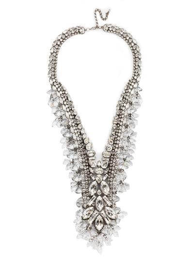 Liviana Statement Necklace - NSP83ASSSH - <p>The Liviana Statement Necklace is a showstopper. Cascading down the neckline with an oval, teardrop and asymmetic crystals that will dance through the night lights with you, lighting up any room. From Sorrelli's Silver Shade collection in our Antique Silver-tone finish.</p>