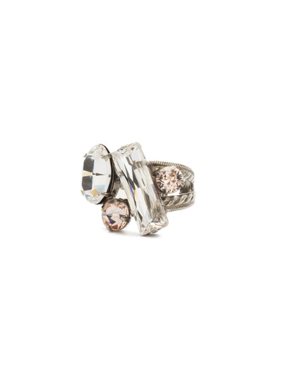 Abstract Cluster Ring - RCF54ASSNB - Available in a variety of colors, this ring showcases abstraction at its finest. Baguette, oval and round cut stones are clustered together at the front and center of this ring and sit atop an double rope designed adjustable band. Exudes style with every angle.