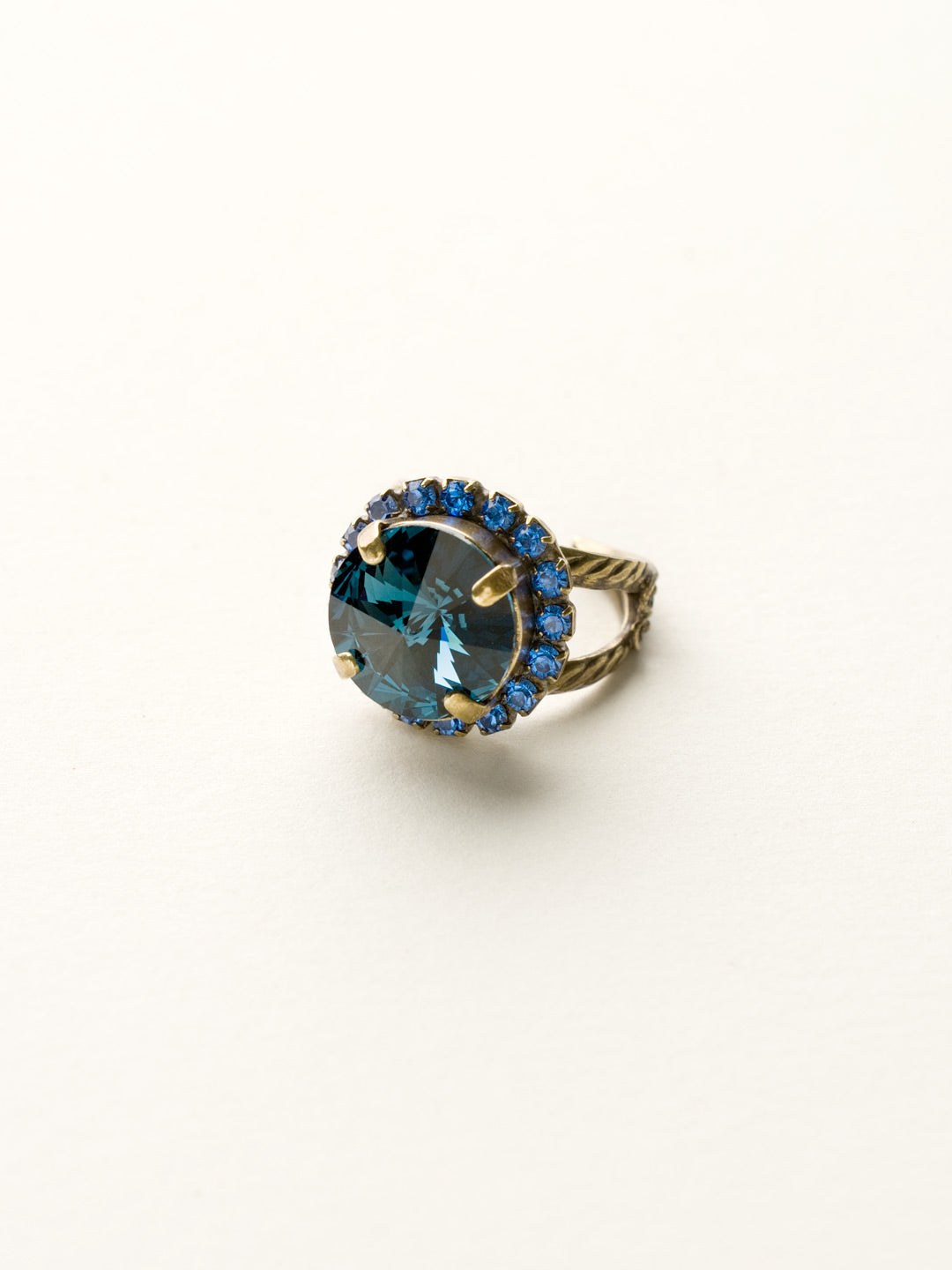 Round Cut Cocktail Ring - RCR60AGDBL - <p>Antique inspired and perfect for everyday! Wear this ring for a little extra sparkle on your digits! From Sorrelli's Dress Blues collection in our Antique Gold-tone finish.</p>