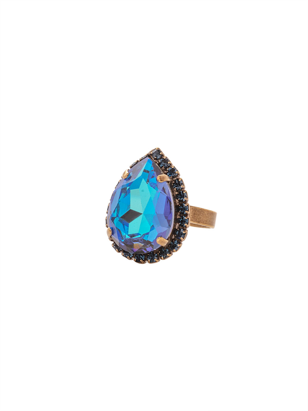 Giselle Pear Cocktail Ring - RFC80AGVBN - <p>The Giselle Pear Cocktail Ring features a halo pear cut crystal on an adjustable band. From Sorrelli's Venice Blue collection in our Antique Gold-tone finish.</p>